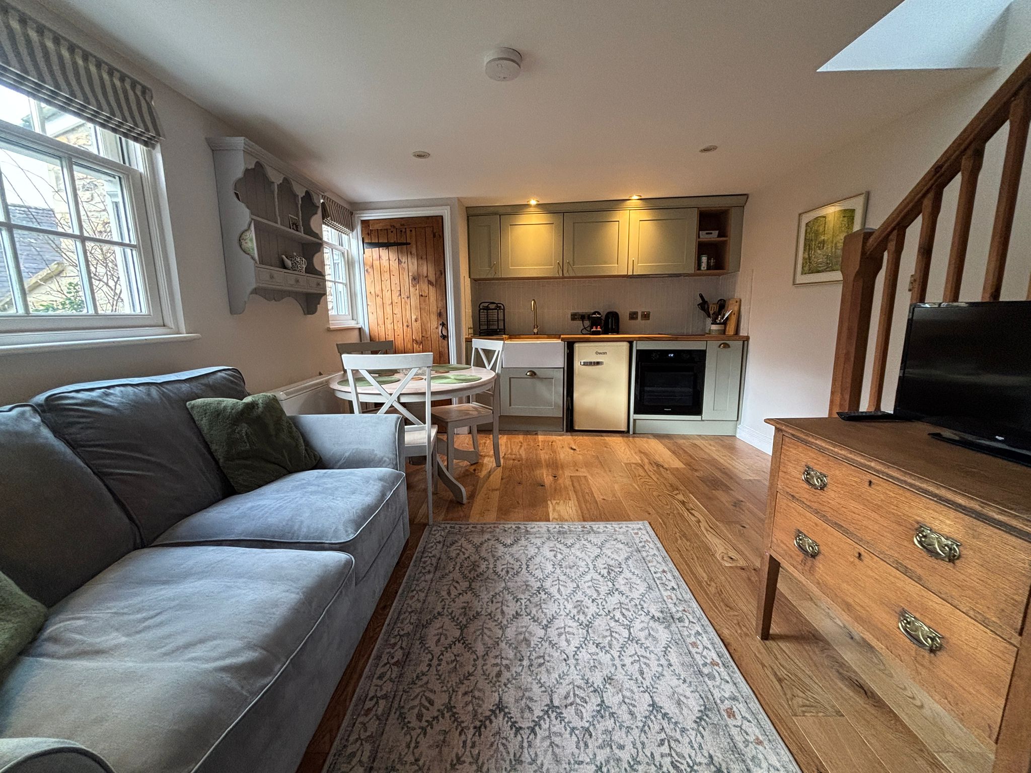 Cosy lit lounge and kitchen area